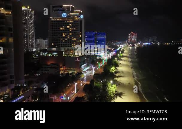 Nha Trang, Vietnam - 03.12.2025: Night time aerial view of city center ...