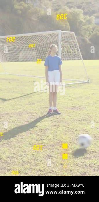 Vertical video: Center girl tapping ball as rolling ball entering goal ...