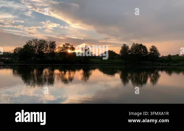 beautiful sunset over the lake Stock Video Footage - Alamy