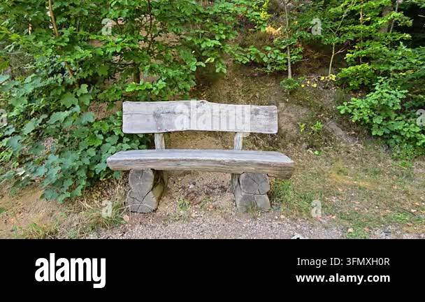 old wood bench in the park Stock Video Footage - Alamy