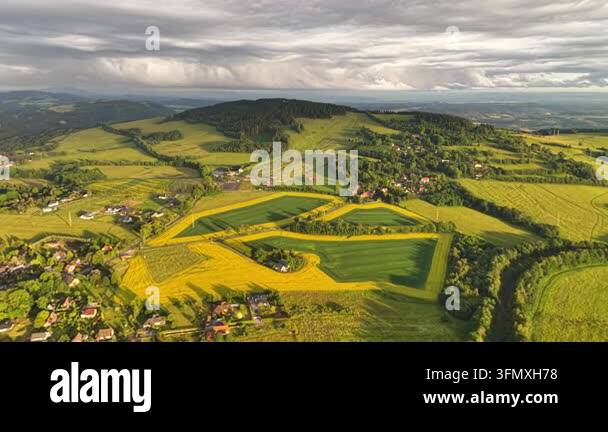 aerial view of beautiful rural landscape with fields and green hills at ...