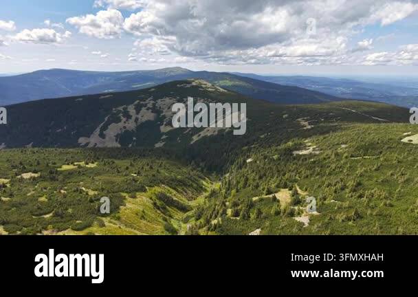 beautiful landscape with green hills, mountains, forest, blue sky ...