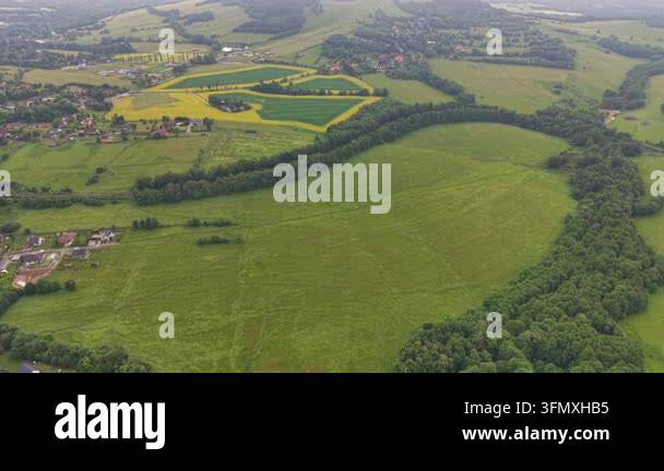 aerial view of agricultural land and agricultural fields in summer time ...