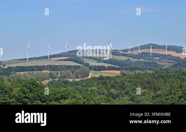 wind turbines and green field Stock Video Footage - Alamy