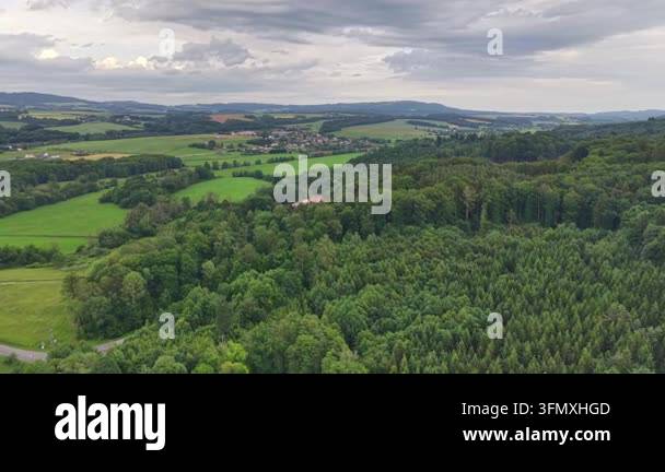 aerial view of a small green field and trees in a summer day Stock ...