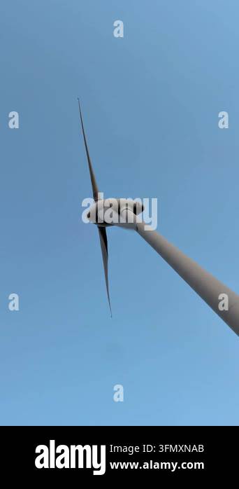 wind turbine with blue sky background Stock Video Footage - Alamy