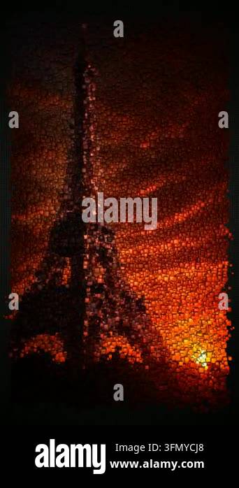 Eiffel Tower in Paris at Sunset with Fiery Red Clouds and Dramatic Warm ...