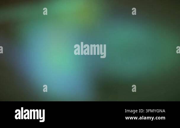 A mesmerizing abstract blurred background video featuring soft glowing ...