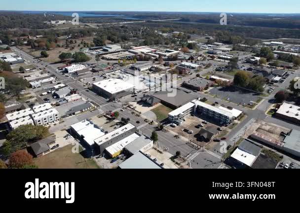 Aerial view of a small town with commercial buildings and trees Stock ...
