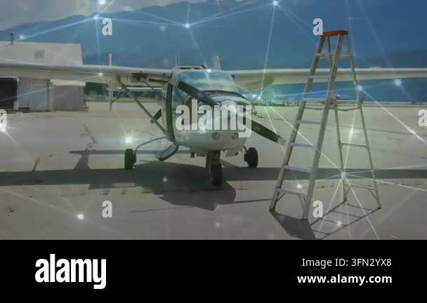 Camera starting close approach, airplane staying parked, network ...