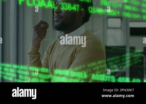 Standing man in tan sweater and collared shirt in modern office ...