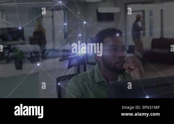 Vertical video: Glowing nodes driving office worker in green shirt from ...