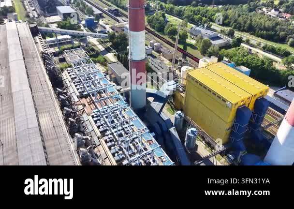 Aerial view of an industrial plant showcasing a series of large pipes ...