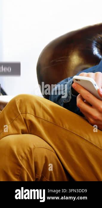 Vertical video: Man tapping white phone, making Subscribe buttons float ...