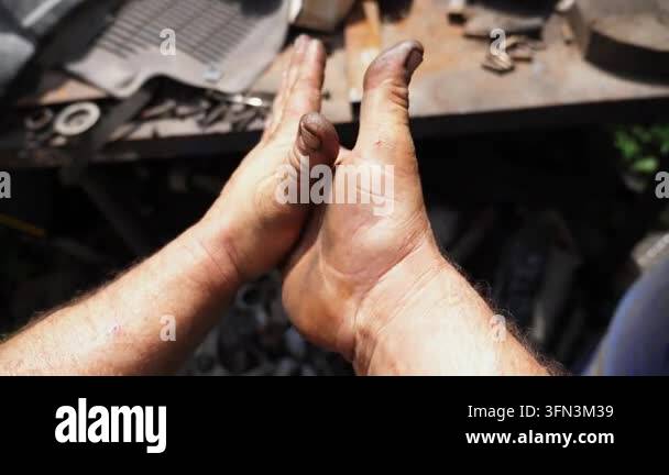Hands of automotive mechanic, showing the progression of a thorough ...