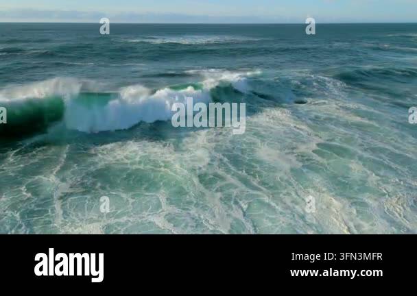 foamy waves crashing on the ocean surface Stock Video Footage - Alamy