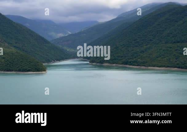Scenic view of river flowing through mountains Stock Video Footage - Alamy