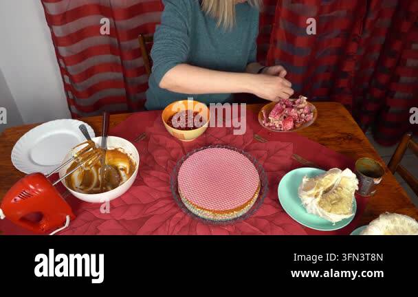 Woman peel pomegranate. Hands with Fruits on table. Cooking food at ...