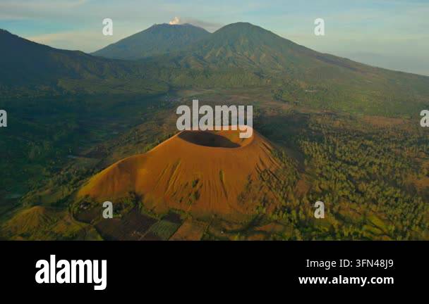 Volcantic Rocks Aerial view of a large volcanic crater in a lush landscape Stock Video ...