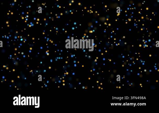 Abstract background of glowing blue and yellow particles floating in ...