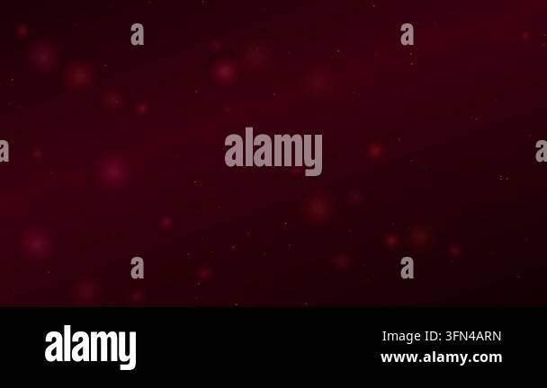 Abstract background with floating red bokeh lights and small golden ...