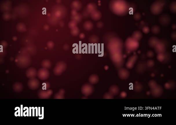 Abstract background with red bokeh lights and particles floating in ...