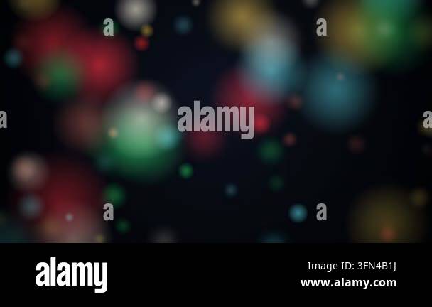 Abstract background with colorful bokeh lights gently floating and ...