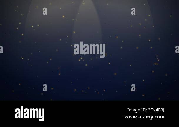 Abstract background with floating golden particles and light rays on a ...