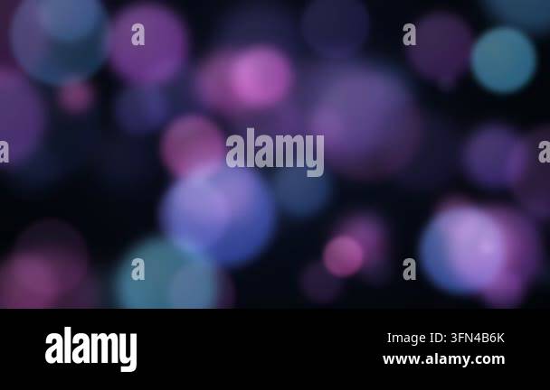 Abstract background with floating bokeh lights in shades of purple and ...