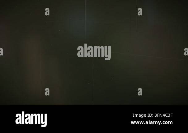 Abstract dark background with subtle light leaks and film grain texture ...
