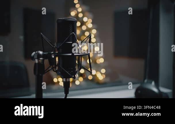 Microphone near decorated christmas tree lights Stock Video Footage - Alamy