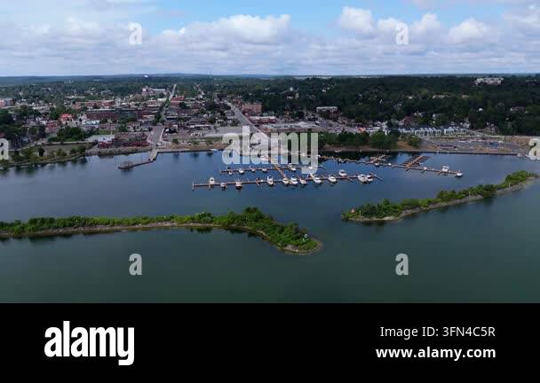 Aerial view of marina and waterfront city Stock Video Footage - Alamy