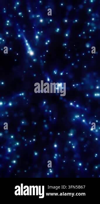 Glowing blue cosmic particles and star-like bokeh lights on a dark ...