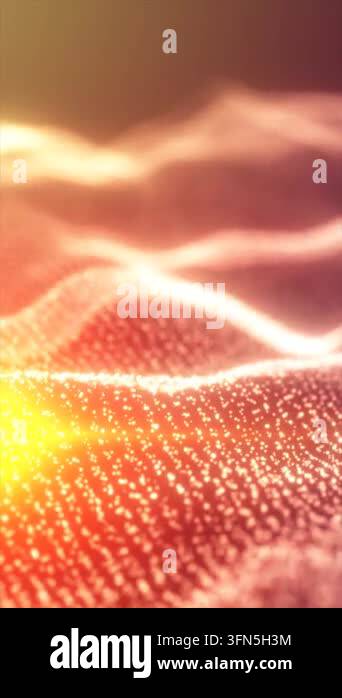 Glowing orange particle waves form a flowing abstract landscape with ...