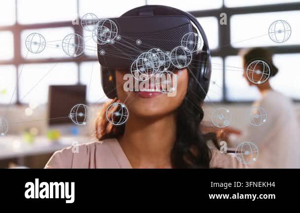 Woman wearing VR headset raising finger in bright office, making 3D ...