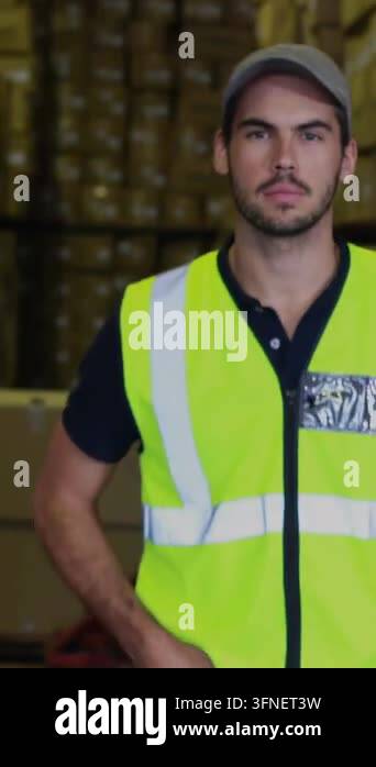 Box File Preview Vertical video: Warehouse man shifting stance celebrating as heart and ...