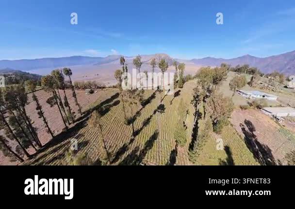Drone fisheye panorama over Cemoro Lawang overlooking Mount Bromo ...