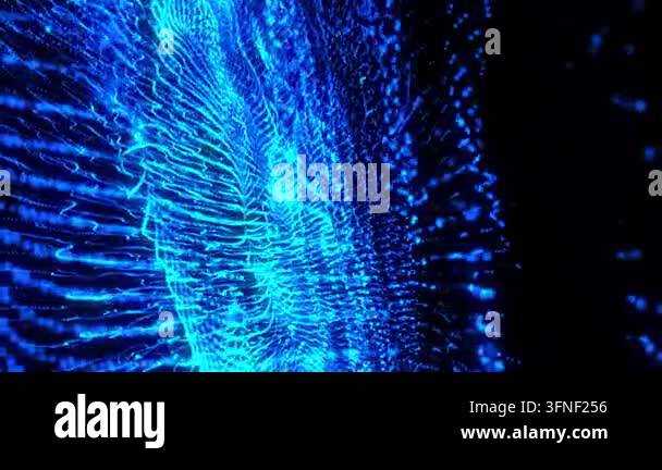 Exploding wave of luminous blue particles in motion against a dark ...