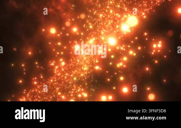 Abstract orange color changing energy particles and waves magical ...