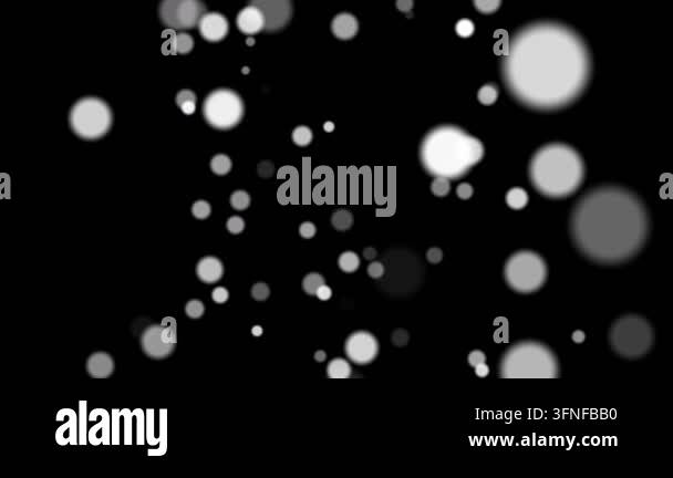 Black background with floating glowing bokeh particles Stock Video ...