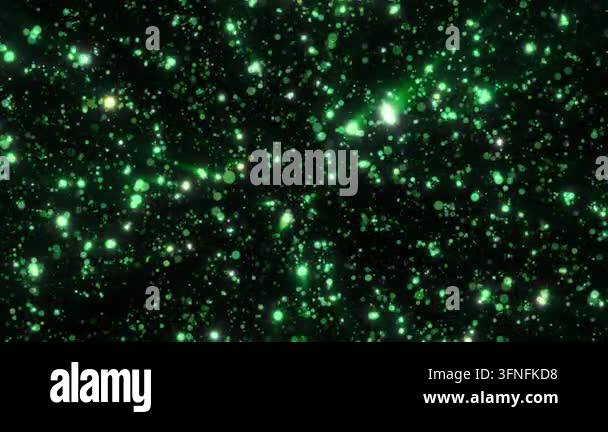 Green glowing bokeh particles scattered on a dark background Stock ...
