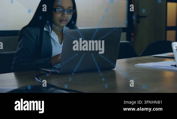 Business woman typing on laptop, camera panning up, numeric overlay ...
