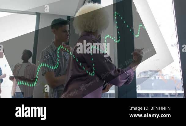 Woman starting data drawing on glass, causing green waveform to align ...