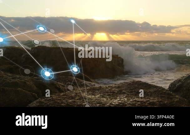 After sun lowering, waves crashing while node network emerging and ...