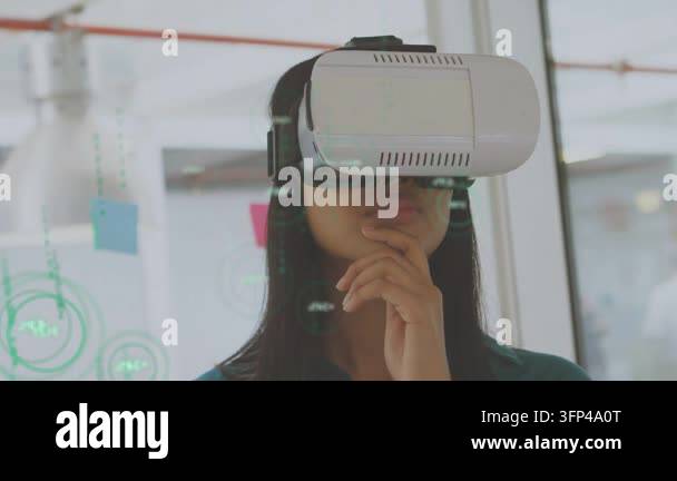 Woman wearing VR headset turning head and showing virtual overlays on ...