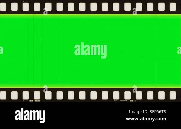 Vintage film strip frame border with green screen chroma key background ...