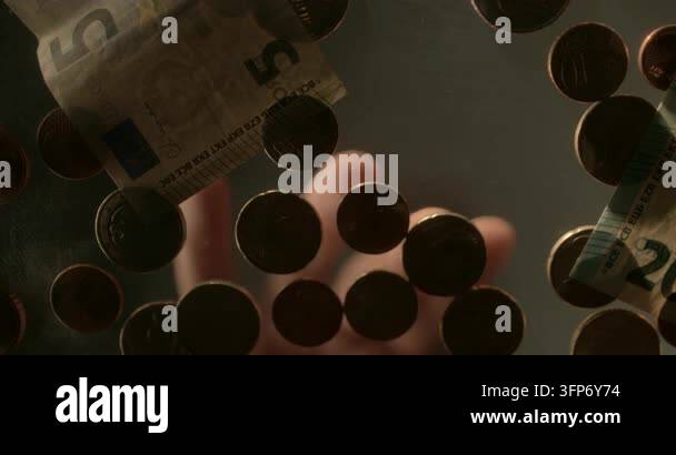 Creative low-angle view from beneath a glass table showing an ...