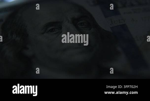 Vector Image Banknote Extreme macro close-up of a hundred US dollar banknote in dark ...