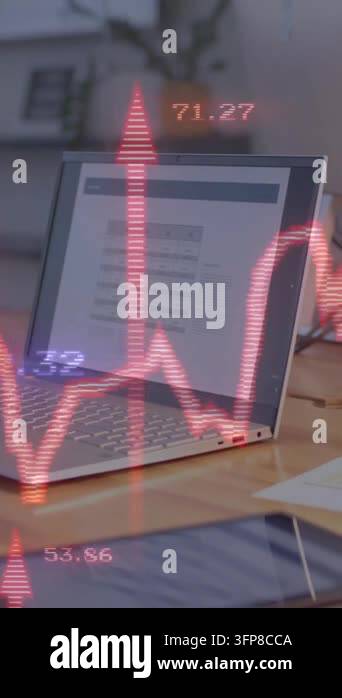 Animation of financial data processing over computer on office desk ...
