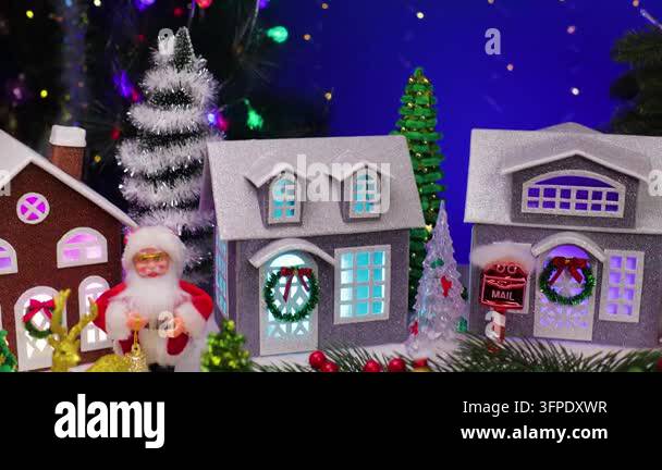 Y Lettering Red A Christmas town with snowmen and letters with a red car near a ...